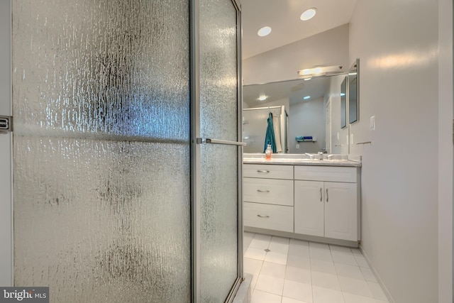 2409 Lightfoot Dr, Baltimore, MD 21209 - full bath with vanity, tile patterned floors, an enclosed shower, recessed lighting, and baseboards
