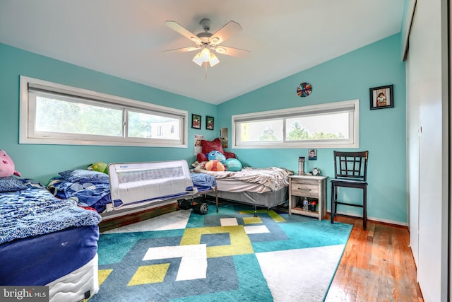 2409 Lightfoot Dr, Baltimore, MD 21209 - bedroom featuring lofted ceiling, hardwood / wood-style floors, a ceiling fan, and baseboards