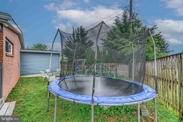 2409 Lightfoot Dr, Baltimore, MD 21209 - view of yard featuring a trampoline