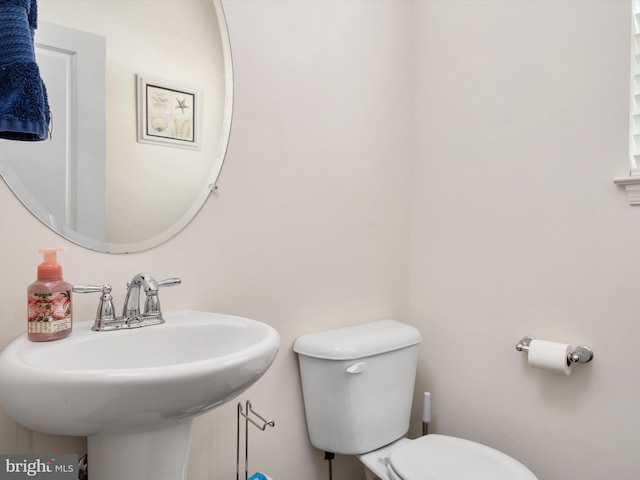 83 Clarence Ave, Severna Park, MD 21146 - half bathroom featuring a sink and toilet