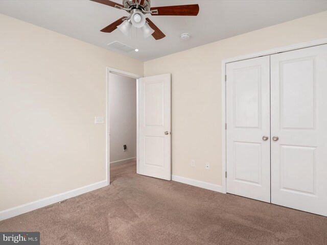 83 Clarence Ave, Severna Park, MD 21146 - unfurnished bedroom featuring carpet flooring, a closet, baseboards, and a ceiling fan