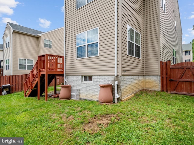 83 Clarence Ave, Severna Park, MD 21146 - rear view of property with stairway, a wooden deck, and a gate