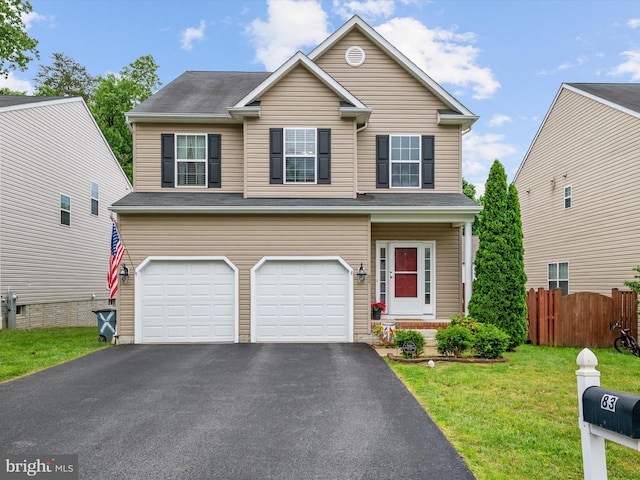 83 Clarence Ave, Severna Park, MD 21146 - traditional-style house with a garage and asphalt driveway