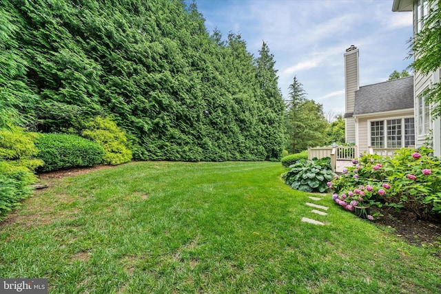 1 Derbyshire Way, Wilmington, DE 19807 - view of green lawn with a wooden deck