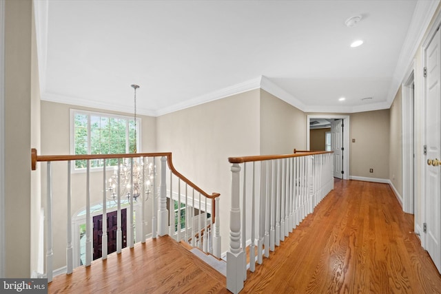 1 Derbyshire Way, Wilmington, DE 19807 - hall featuring an upstairs landing, recessed lighting, wood finished floors, and crown molding
