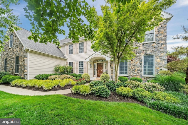 1 Derbyshire Way, Wilmington, DE 19807 - view of front of property featuring stone siding and a front yard