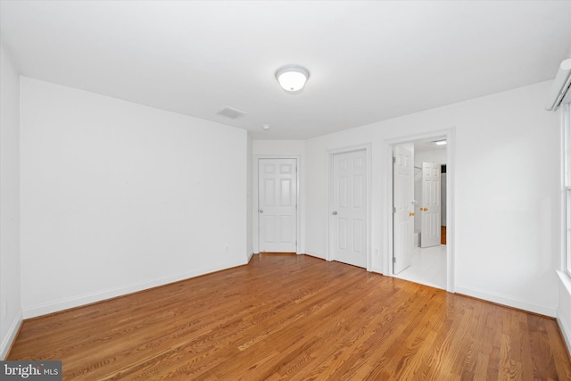 1 Derbyshire Way, Wilmington, DE 19807 - unfurnished bedroom with light wood finished floors and baseboards