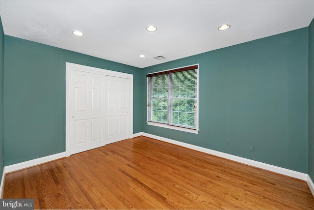1 Derbyshire Way, Wilmington, DE 19807 - unfurnished bedroom featuring a closet, wood finished floors, and recessed lighting
