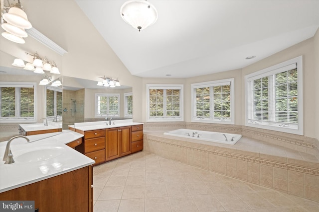 1 Derbyshire Way, Wilmington, DE 19807 - bathroom with two vanities, tile patterned floors, a tile shower, a garden tub, and lofted ceiling