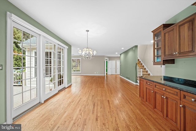 1 Derbyshire Way, Wilmington, DE 19807 - kitchen with a chandelier, light wood finished floors, plenty of natural light, brown cabinetry, and recessed lighting