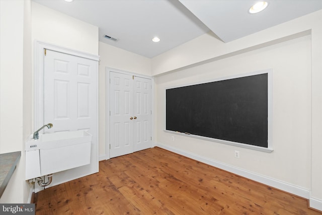 1 Derbyshire Way, Wilmington, DE 19807 - unfurnished bedroom featuring wood finished floors, a closet, and recessed lighting