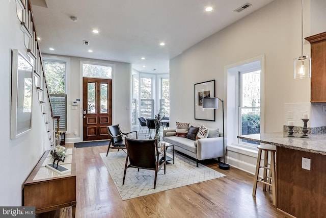 251 8th St NE, Washington, DC 20002 - living area with light wood-style flooring, recessed lighting, and baseboards