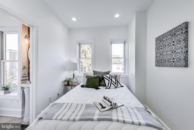 251 8th St NE, Washington, DC 20002 - bedroom with recessed lighting, baseboards, and wood finished floors