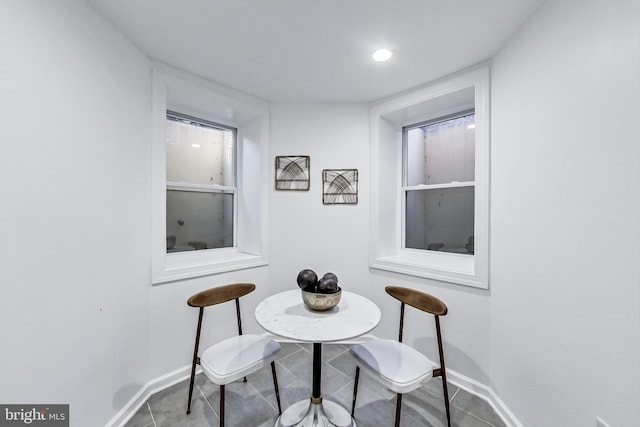 251 8th St NE, Washington, DC 20002 - dining area with baseboards and tile patterned floors