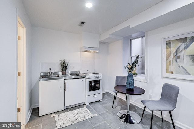 251 8th St NE, Washington, DC 20002 - kitchen featuring white electric range oven, stainless steel countertops, under cabinet range hood, white cabinets, and a sink