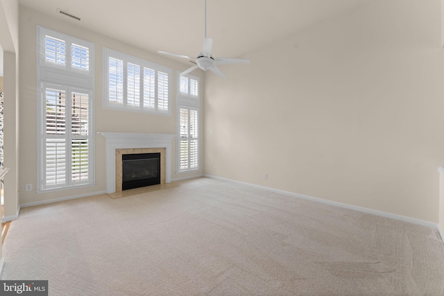 327 Astilbe Dr, Kennett Square, PA 19348 - unfurnished living room featuring baseboards, carpet, healthy amount of natural light, and a ceiling fan