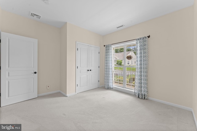 327 Astilbe Dr, Kennett Square, PA 19348 - unfurnished bedroom featuring carpet floors, baseboards, and a closet