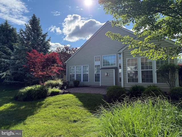 327 Astilbe Dr, Kennett Square, PA 19348 - rear view of house featuring a yard and a patio