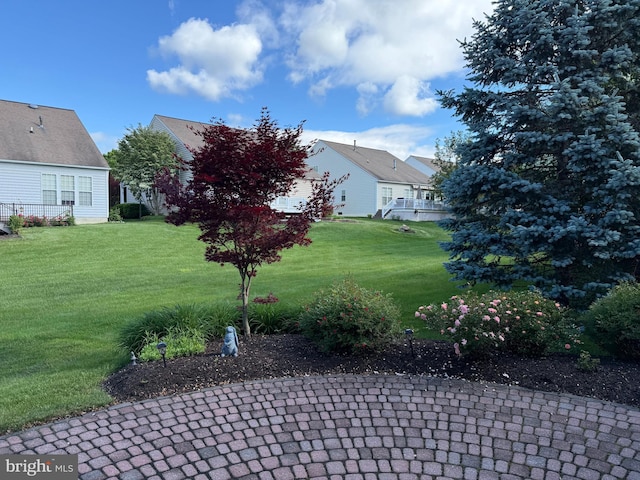 327 Astilbe Dr, Kennett Square, PA 19348 - view of grassy yard featuring a patio area and a residential view