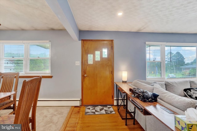 800 Delta Rd, Red Lion, PA 17356 - foyer entrance with a baseboard heating unit and wood finished floors