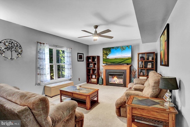 701 Antietam Dr, Douglassville, PA 19518 - carpeted living area featuring a glass covered fireplace, ceiling fan, and baseboards