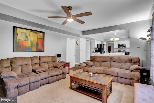 701 Antietam Dr, Douglassville, PA 19518 - living room with a ceiling fan, a chandelier, and light carpet