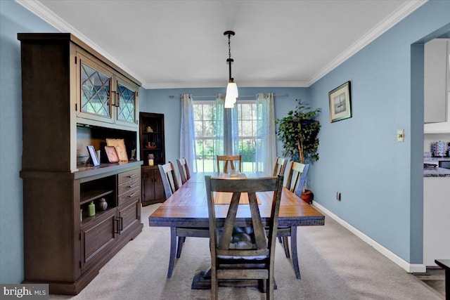 701 Antietam Dr, Douglassville, PA 19518 - dining area featuring crown molding, baseboards, and light carpet