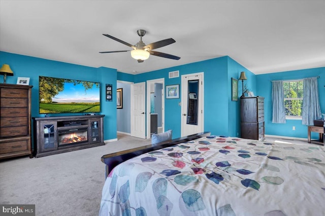 701 Antietam Dr, Douglassville, PA 19518 - bedroom featuring carpet floors, baseboards, a glass covered fireplace, and a ceiling fan