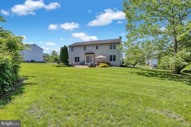 701 Antietam Dr, Douglassville, PA 19518 - rear view of house featuring a patio area and a yard
