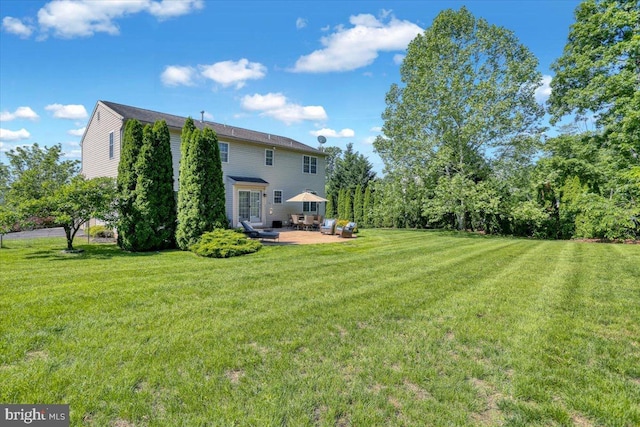 701 Antietam Dr, Douglassville, PA 19518 - view of green lawn with a patio area
