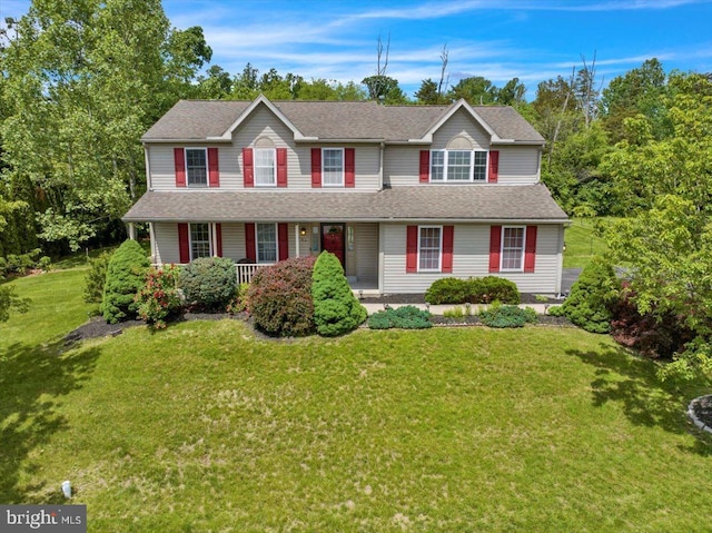 701 Antietam Dr, Douglassville, PA 19518 - view of front of house with covered porch, a front yard, and a shingled roof