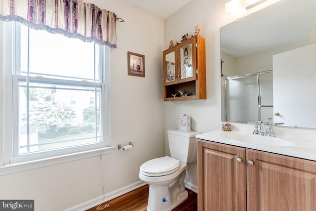56 Ridgewood Way, Burlington, NJ 08016 - full bathroom featuring toilet, wood finished floors, vanity, a shower with shower door, and baseboards
