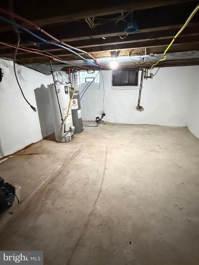2324 N Lambert St, Philadelphia, PA 19132 - unfinished basement with gas water heater and electric water heater
