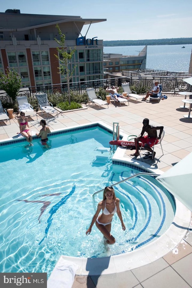 155 Potomac Psge Unit 634, Oxon Hill, MD 20745 - community pool featuring a patio area and a water view