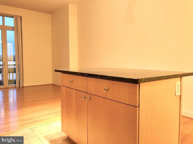155 Potomac Psge Unit 634, Oxon Hill, MD 20745 - detailed view of wood finished floors and baseboards