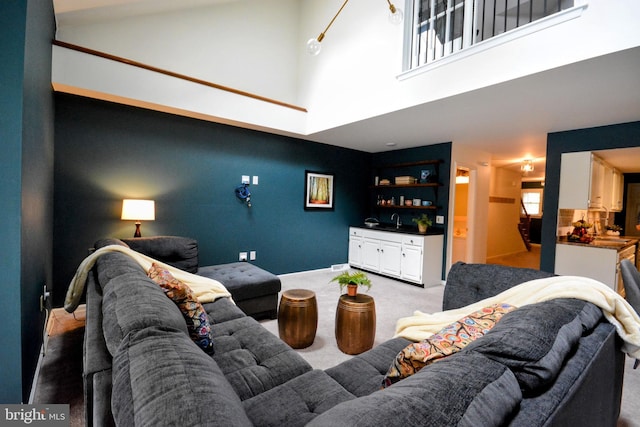 138 Pepperton Ct, Lititz, PA 17543 - carpeted living area with a high ceiling and bar area