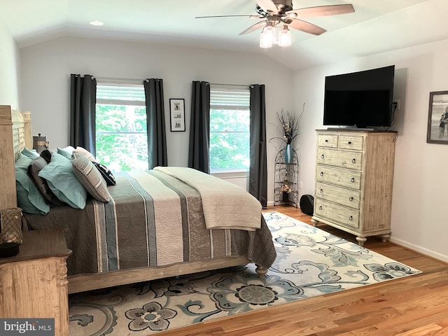 347 Lakewood Cir, Mineral, VA 23117 - bedroom with lofted ceiling, light wood-style floors, and a ceiling fan