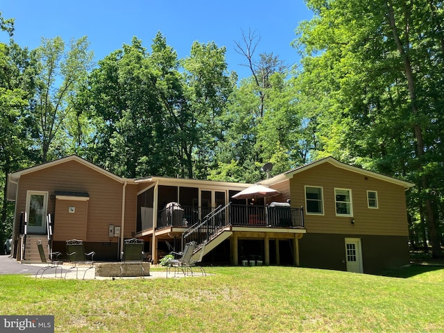 347 Lakewood Cir, Mineral, VA 23117 - back of house featuring a wooden deck, stairs, a yard, and a patio