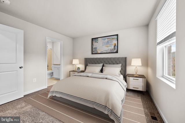 641 S Haven St, Baltimore, MD 21224 - bedroom featuring multiple windows, carpet, baseboards, and ensuite bathroom