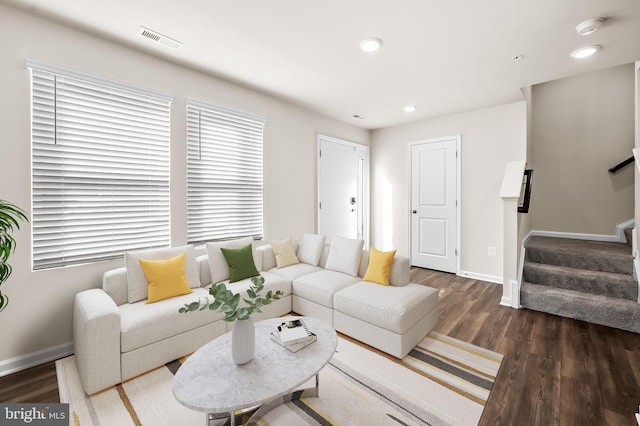 641 S Haven St, Baltimore, MD 21224 - living room with wood finished floors, baseboards, stairway, and recessed lighting