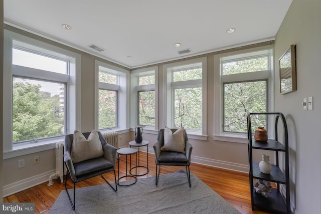 1752 17th St NW, Washington, DC 20009 - living area with baseboards, wood finished floors, and crown molding