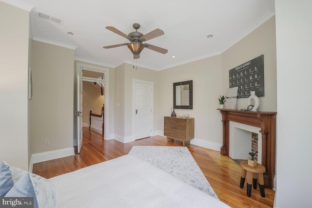 1752 17th St NW, Washington, DC 20009 - bedroom featuring wood finished floors, baseboards, crown molding, recessed lighting, and a ceiling fan