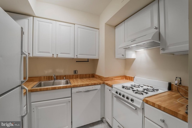 1752 17th St NW, Washington, DC 20009 - kitchen featuring white appliances, ventilation hood, wood counters, a sink, and white cabinets