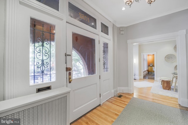1752 17th St NW, Washington, DC 20009 - entryway with light wood-style floors, ornamental molding, baseboards, and recessed lighting