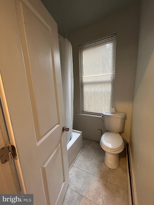 2229 Memphis St, Philadelphia, PA 19125 - full bath with toilet, baseboard heating, tile patterned floors, and shower / bath combo