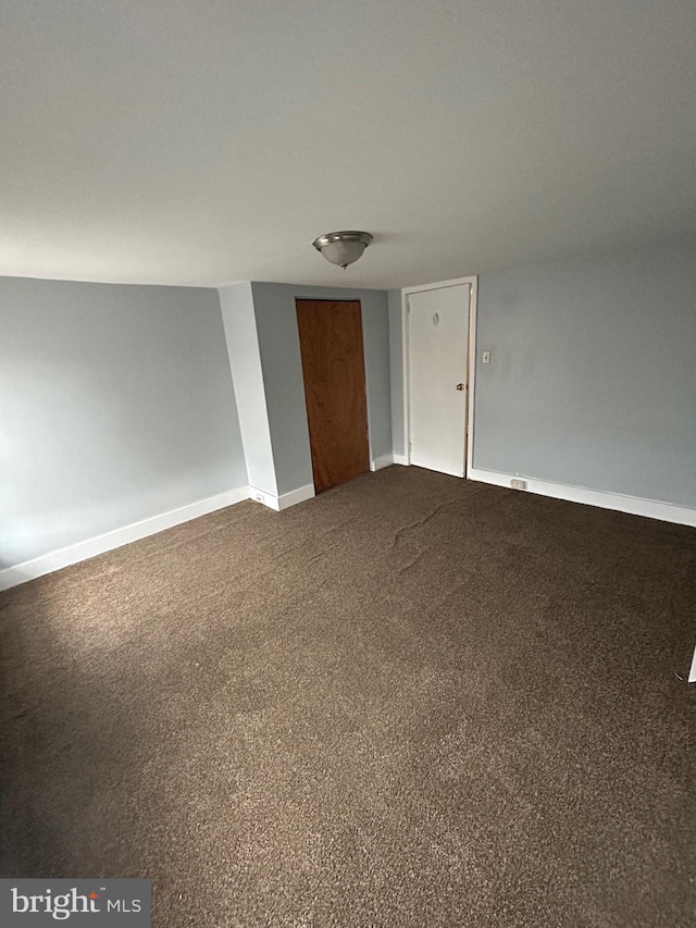 2229 Memphis St, Philadelphia, PA 19125 - unfurnished room with dark colored carpet and baseboards