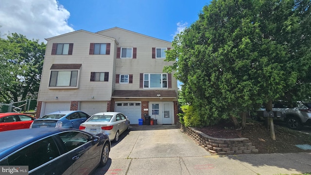 1532 Marcy Pl Unit B, Philadelphia, PA 19115 - multi unit property with driveway, an attached garage, and brick siding