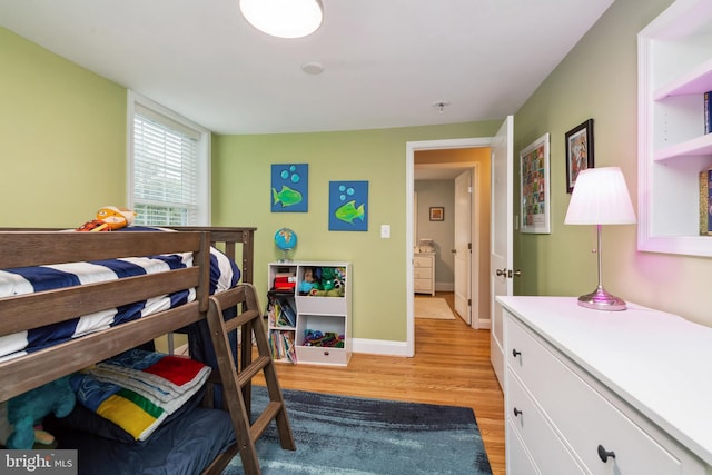 511 Wilton Rd, Towson, MD 21286 - bedroom with light wood-style floors and baseboards