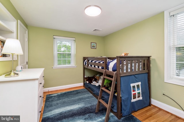 511 Wilton Rd, Towson, MD 21286 - bedroom with light wood-type flooring and baseboards