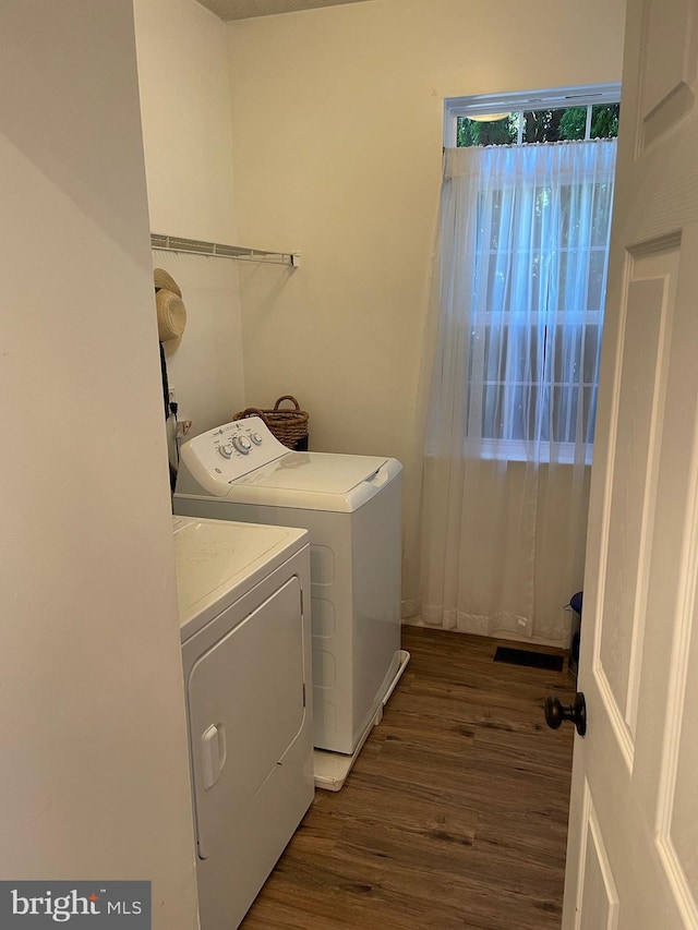 2974 Corona Ct, Manchester, MD 21102 - laundry room featuring separate washer and dryer and wood finished floors
